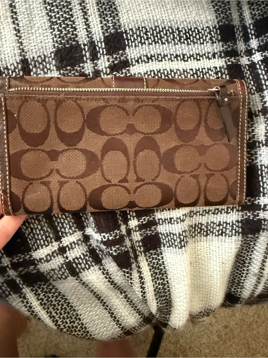 Coach Signature Canvas Shoulder Bag in Brown. Matching Coach wallet main image 10